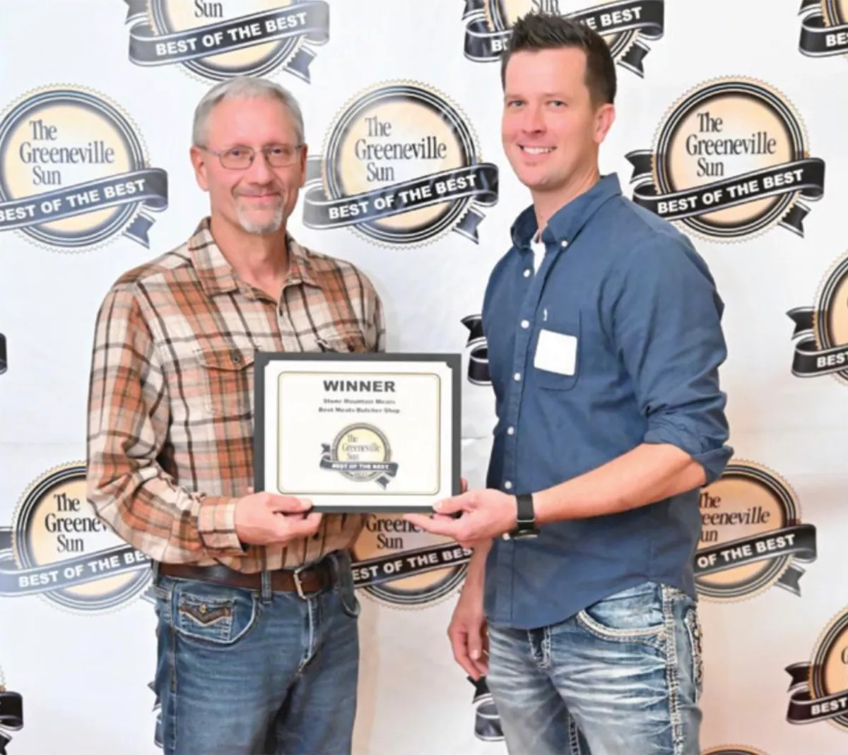 The Fillers family holding the 2025 Best of the Best winner’s certificate